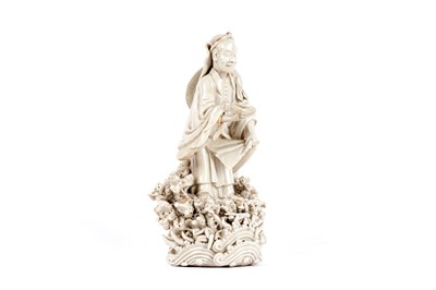 Lot 714 - A Chinese 'Blanc de Chine' figure of a farmer