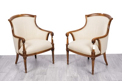 Lot 11 - A pair of Regency style beech framed open armchairs