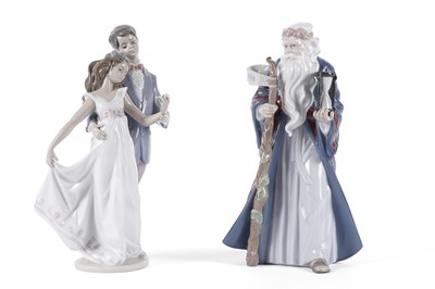 Lot 869 - A Lladro ‘Father Time’ figure; and a ‘Now and Forever’ figure group