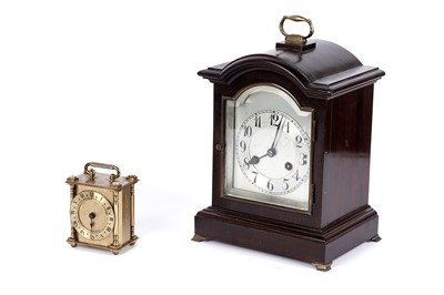 Lot 604 - Junghans: a mahogany cased 8-day mantel clock; and Smiths brass timepiece