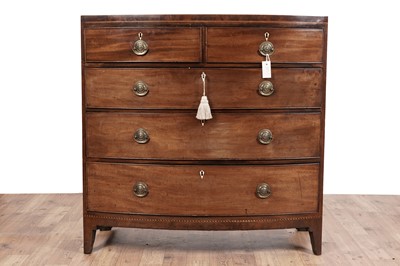 Lot 530 - A George III inlaid mahogany and satinwood banded bow front chest of drawers
