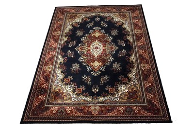 Lot 580 - A Persian style machine made Kashmir carpet