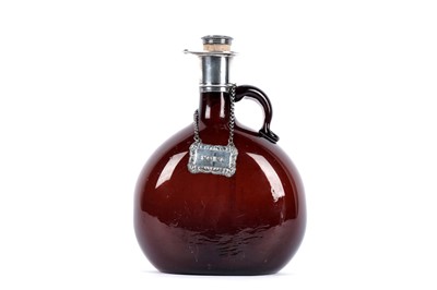 Lot 879 - An early Victorian silver-mounted blown glass decanter; and a silver decanter label