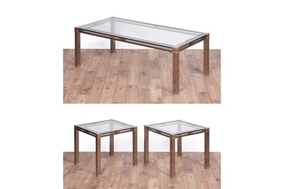 Lot 555 - A pair of contemporary brass mounted aluminium lamp tables; and matching coffee table