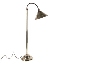 Lot 564 - An adjustable brass standard lamp