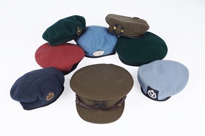 Lot 332 - ﻿﻿A selection of British military berets with badges; and an army officers peaked cap
