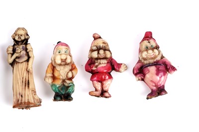 Lot 569 - A complete set of late 1930's Snow White and the Seven Dwarfs charms