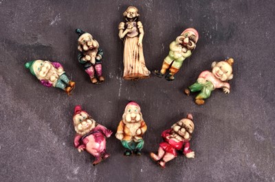 Lot 569 - A complete set of late 1930's Snow White and the Seven Dwarfs charms