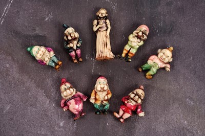 Lot 569 - A complete set of late 1930's Snow White and the Seven Dwarfs charms