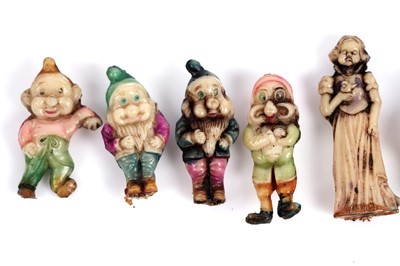 Lot 569 - A complete set of late 1930's Snow White and the Seven Dwarfs charms