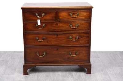 Lot 91 - A George III mahogany and banded chest of drawer