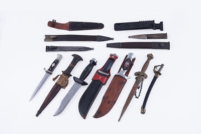 Lot 304 - A selection of knifes and scabbards