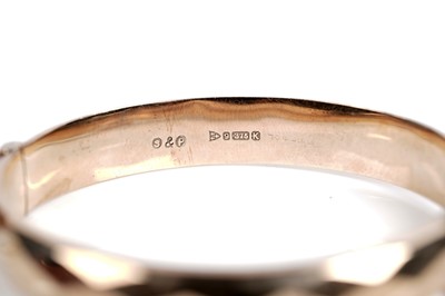 Lot 510 - A 9ct gold bangle