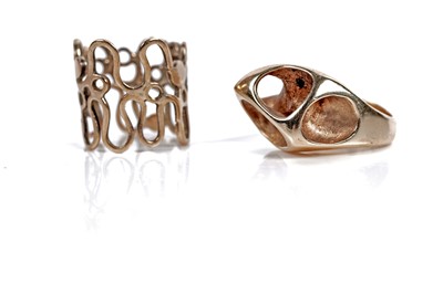 Lot 529 - Two Mid-Century and Modern style gold rings