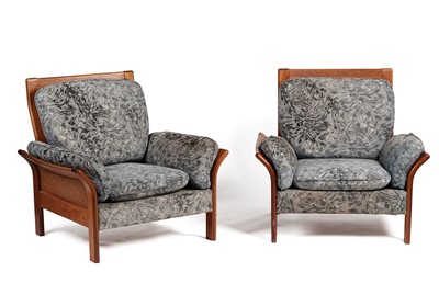 Lot 668 - A pair of circa 1970’s teak and canework armchairs