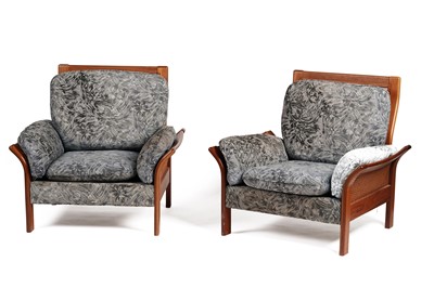 Lot 669 - A pair of circa 1970’s teak and canework armchairs