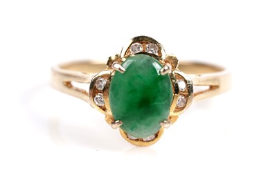 Lot 526 - A jadeite and diamond ring and earring set
