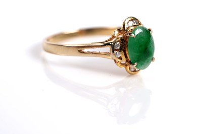 Lot 526 - A jadeite and diamond ring and earring set