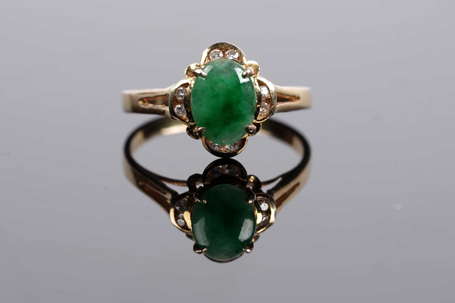 Lot 526 - A jadeite and diamond ring and earring set