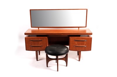 Lot 610 - G-Plan: a teak ‘Fresco’ dressing table; and matching stool