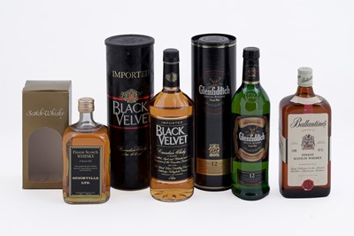 Lot 49 - Four bottles of whisky: Ballantines, Black Velvet and others