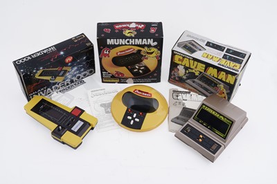 Lot 324 - Three boxed handheld video games