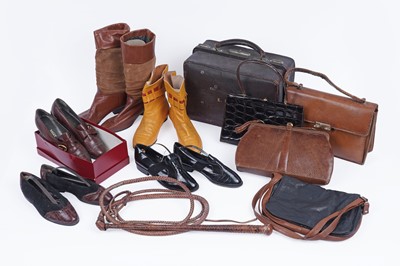 Lot 69 - A vintage travel bag and accessories; and a leather whip