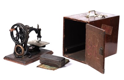Lot 128 - An American sewing machine by Willcox and Gibbs