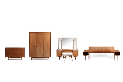 Lot 624 - John Herbert for A Younger Ltd: a French walnut bedroom suite