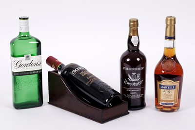 Lot 59 - A selection of port and spirits; and a bottle cradle