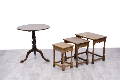 Lot 13 - A 19th Century mahogany tripod table; and a 20th Century carved oak nest of three tables