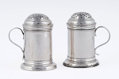 Lot 77 - A matched pair of antique silver kitchen peppers