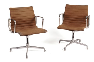Lot 627 - Charles and Ray Eames for Herman Miller: a pair of mid-20th Century EA108 revolving office chairs
