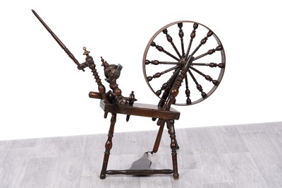 Lot 26 - A late Georgian mahogany spinning wheel