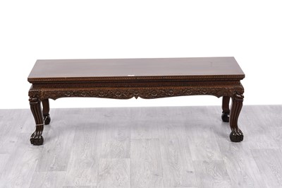 Lot 29 - A 20th Century Chinese carved and stained hardwood coffee table