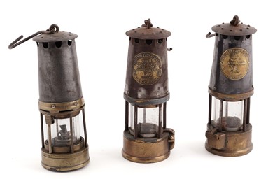 Lot 450 - Three early 20th Century miner's lamps