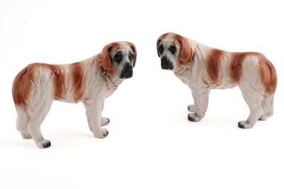 Lot 291 - A pair of late 19th Century Staffordshire dogs