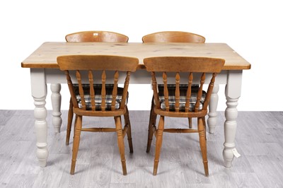 Lot 36 - A pine farmhouse style dining table; and a set of four beech chairs