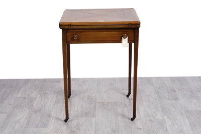 Lot 63 - An Edwardian inlaid mahogany and satinwood banded envelope card table