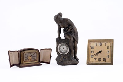 Lot 163 - Two French Art Deco gilt brass clocks; and a cast plaster bronzed figural lamp