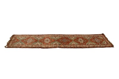 Lot 140 - A Persian Caucasian runner