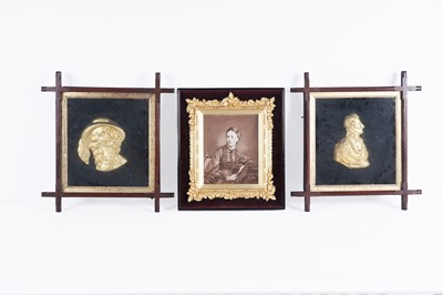 Lot 240 - A late Victorian photographic portrait of a lady; and two other carved portraits