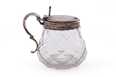 Lot 568 - A Victorian silver mounted clear glass mustard pot