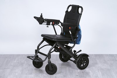 Lot 460 - An unbranded carbon fibre effect mobility chair