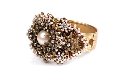 Lot 222 - A Stanley Hagler faux-pearl and paste cuff bracelet