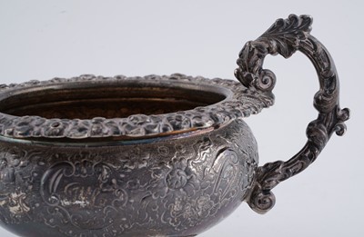 Lot 114 - A late George III silver three piece tea service