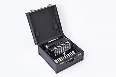Lot 3 - A Chanoon 48 bass student accordion