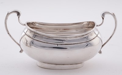 Lot 15 - A George V silver four piece tea service; and an Elizabeth II silver salver