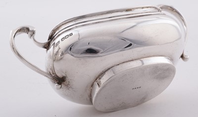 Lot 15 - A George V silver four piece tea service; and an Elizabeth II silver salver