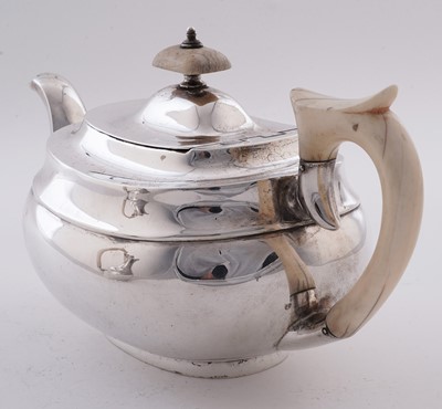 Lot 15 - A George V silver four piece tea service; and an Elizabeth II silver salver